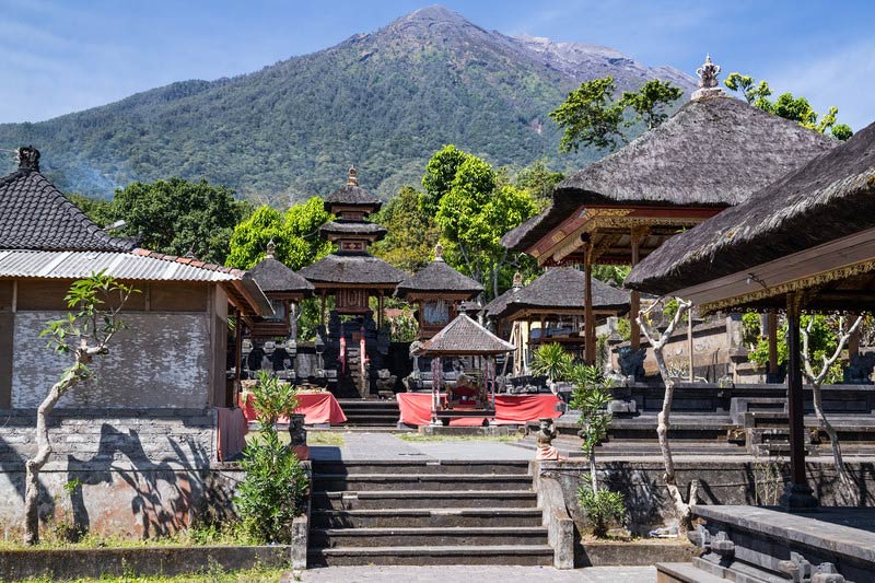 Pura Besakih temple with the summit of Mount Agung in the background.