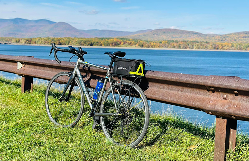 Bike parked in front of a lake on a Backroads Cycling tour of upstate New York