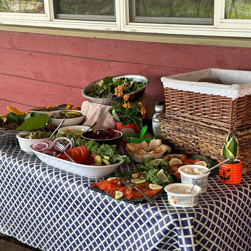 Table of delicous food prepared by the Backroads team on the cycling tour of upstate NY